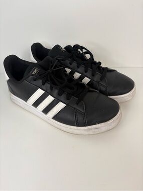 Black Sneakers with White Stripes